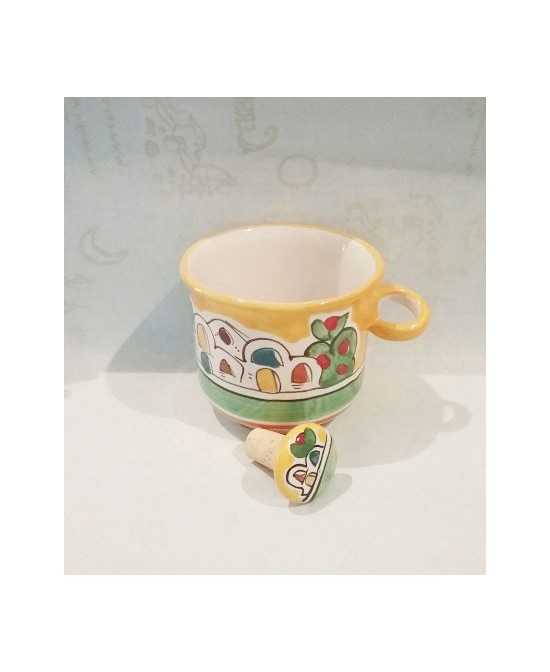 Bottle holder with ceramic cap