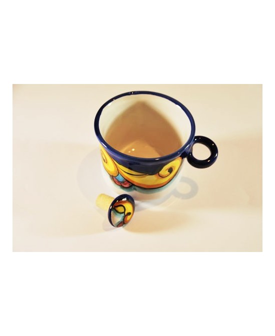 Bottle holder with ceramic cap