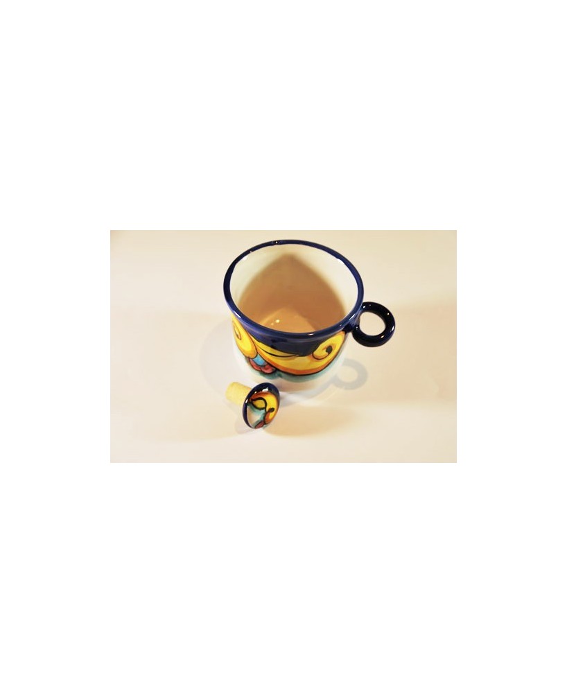 Bottle holder with ceramic cap