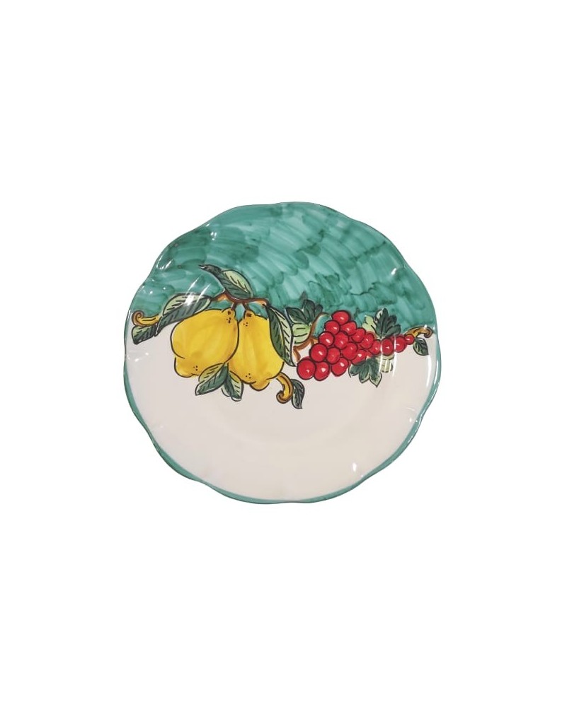 coplates decorated grapes and lemons